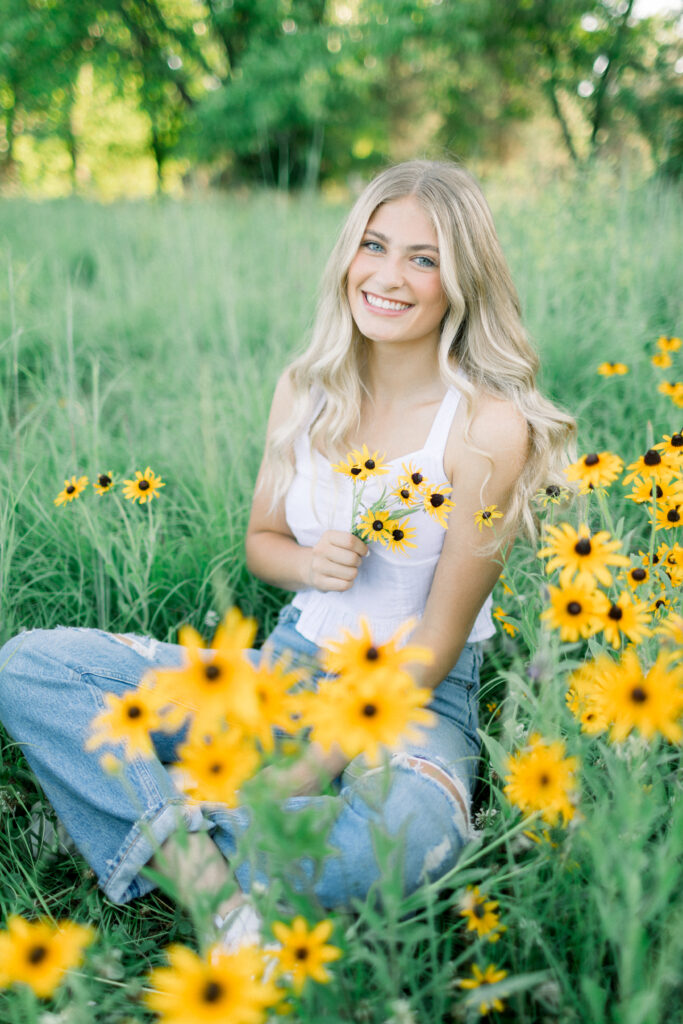 High School Senior Girl Smiling with Wildflowers 