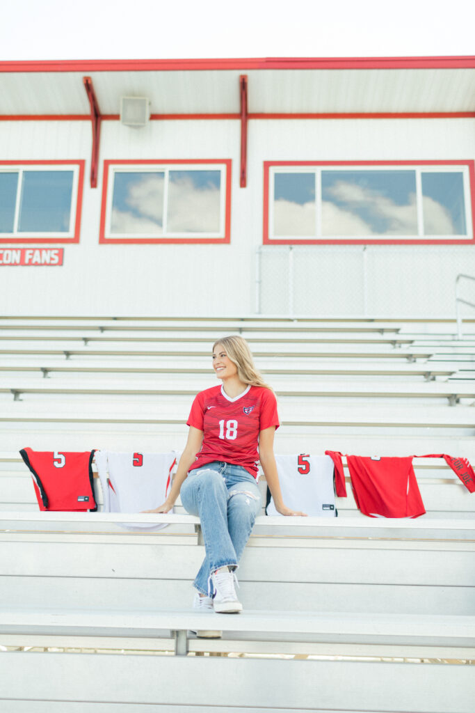 Shanely Bleachers with Jerseys for Senior Photos in Fargo, ND