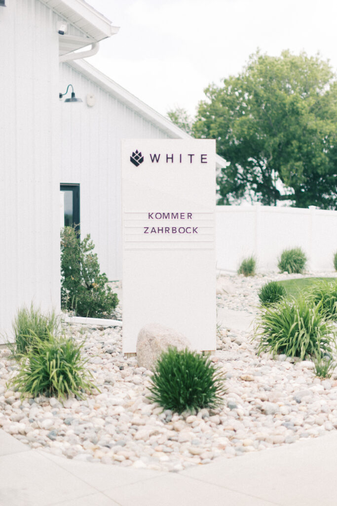 entrance sign at the pines wedding venue 