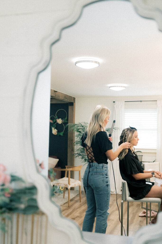 hair stylist doing the hair