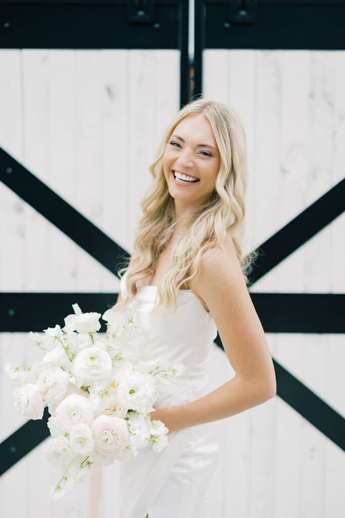 bride holding flowers