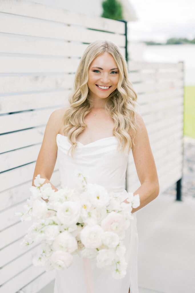 bride holding flowers
