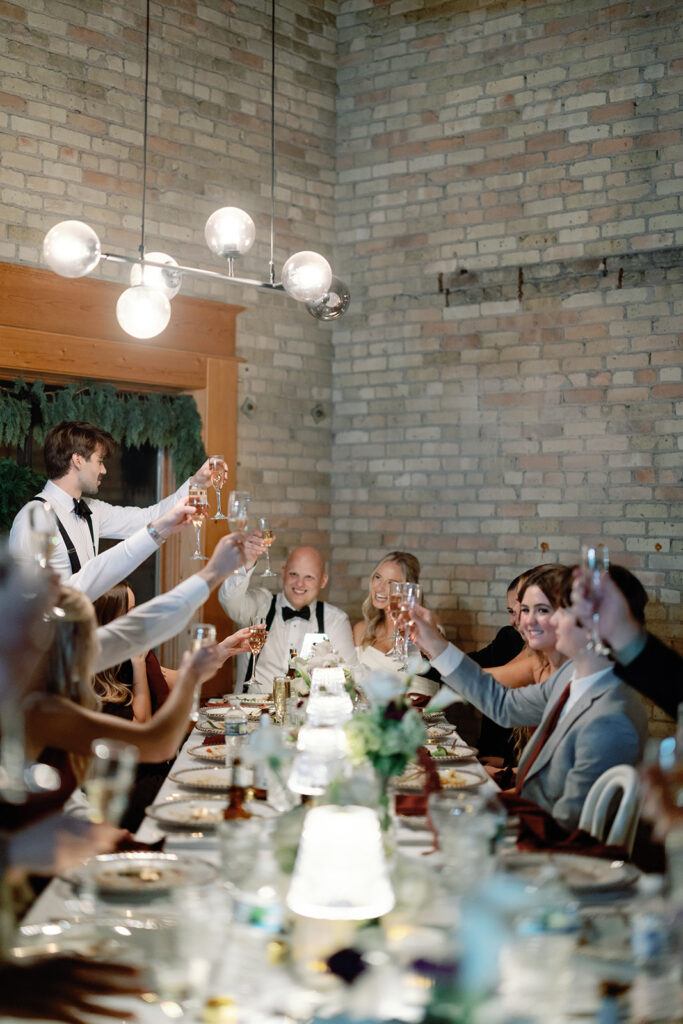 bride and groom eating at reception