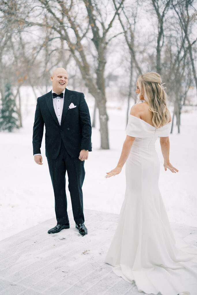 bride and groom first look at an intimate wedding 