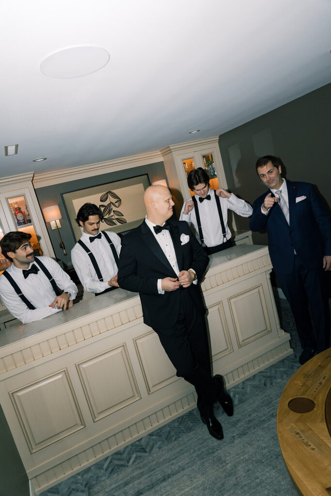 Groom and groomsmen getting ready 