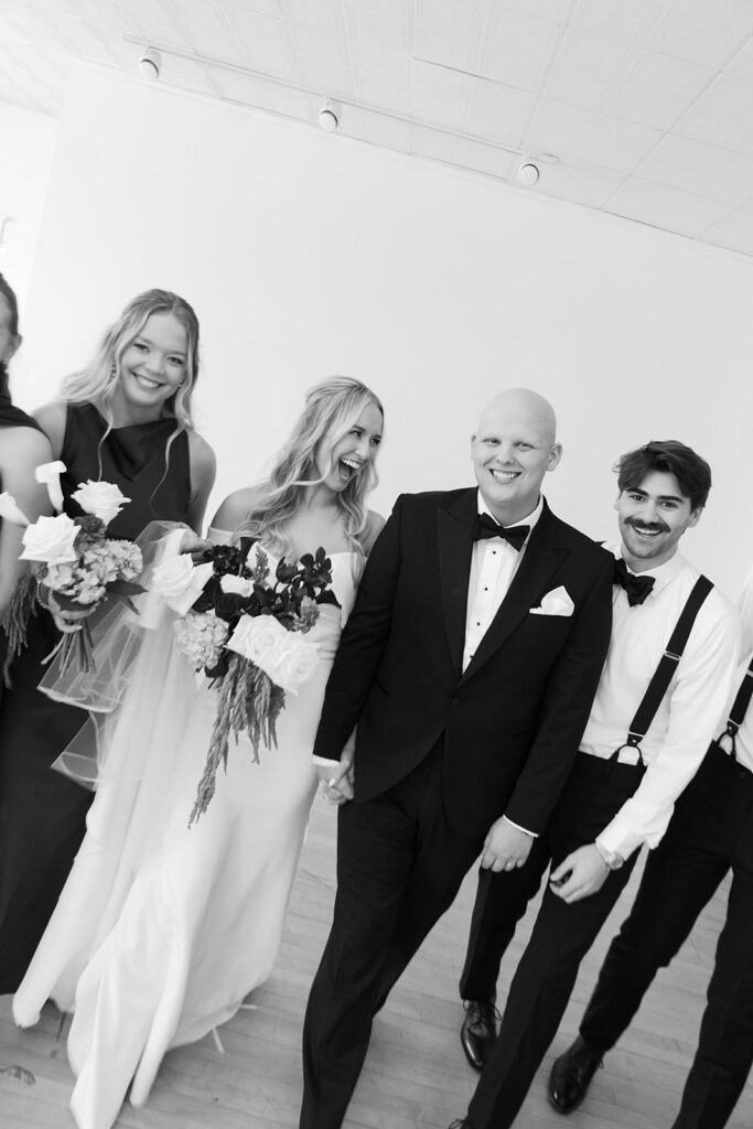 wedding party photos walking towards the camera