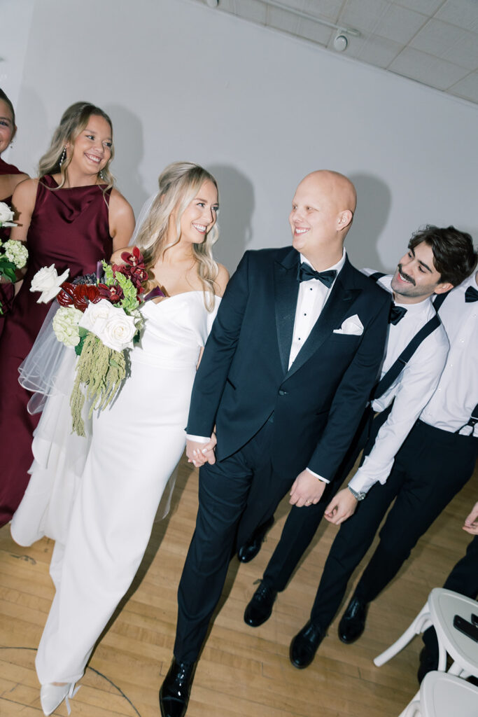 wedding party photos walking towards the camera