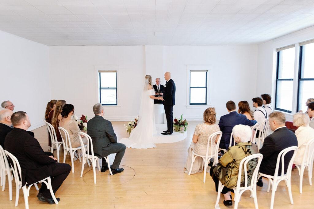 wedding ceremony bride and groom at the alter