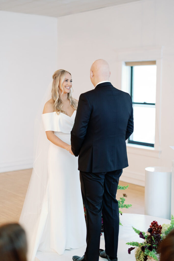 wedding ceremony bride and groom at the alter