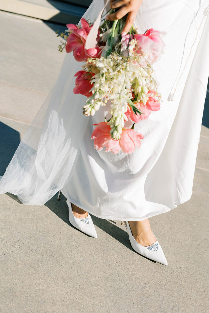 Bride holding a bouquet during a Scripps Seaside elopement