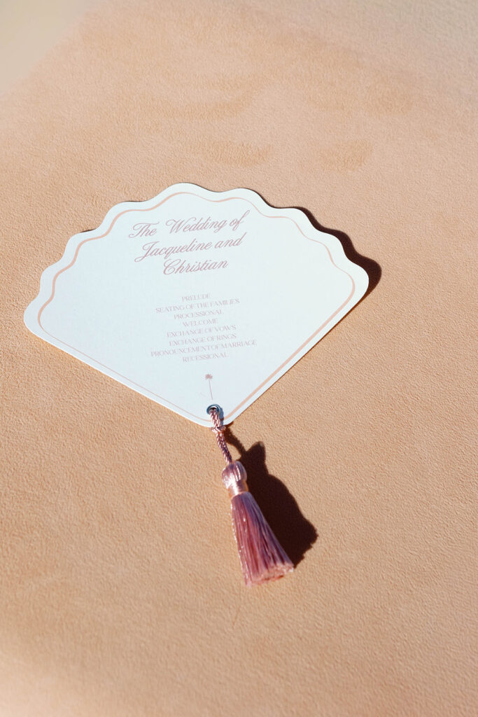 Wedding program at Scripps Seaside beach during an intimate elopement