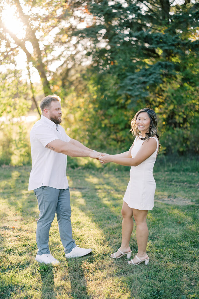 engagement session location idea, couple posing in a park