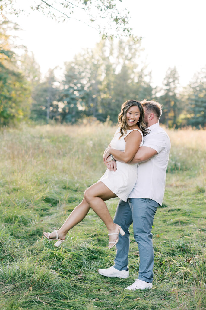 engagement session location idea, couple embracing in a park