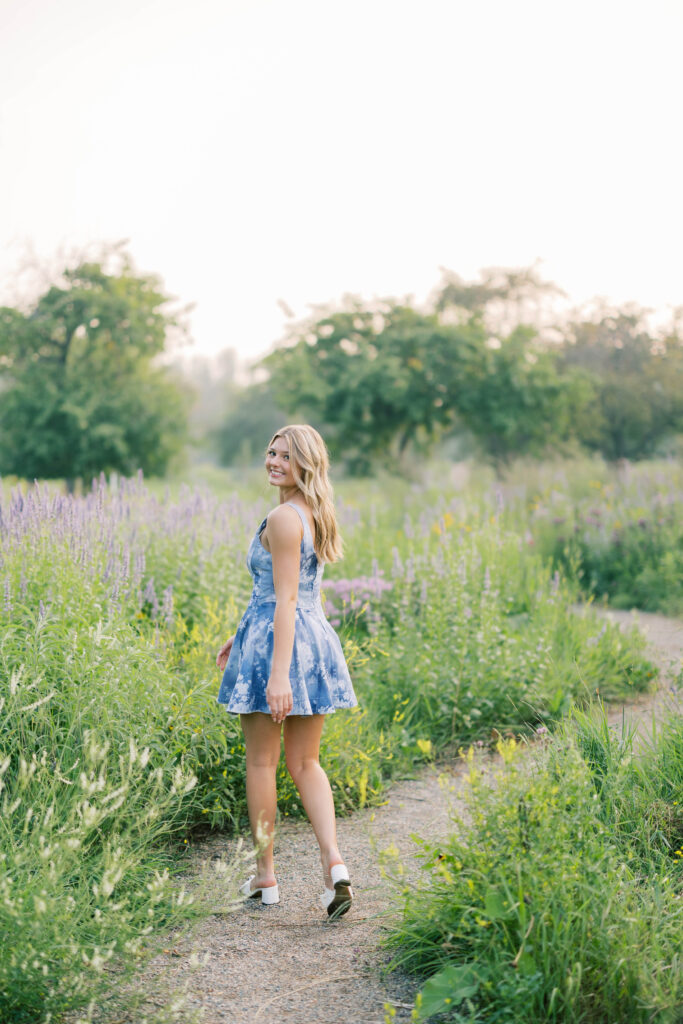 senior session, photo of a senior poising in nature