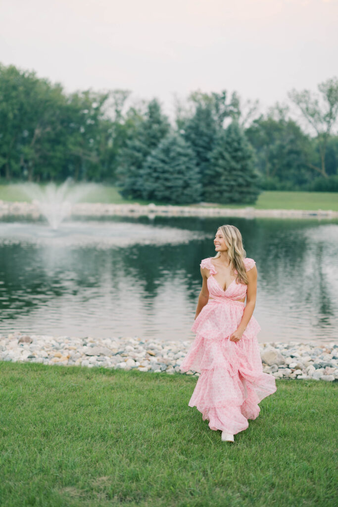 senior session, photo of a senior posing in front of a lake