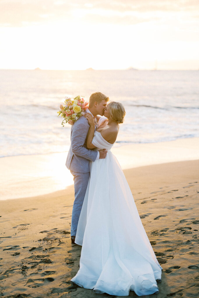 bride and groom beach wedding, maui, hawaii, at sunset