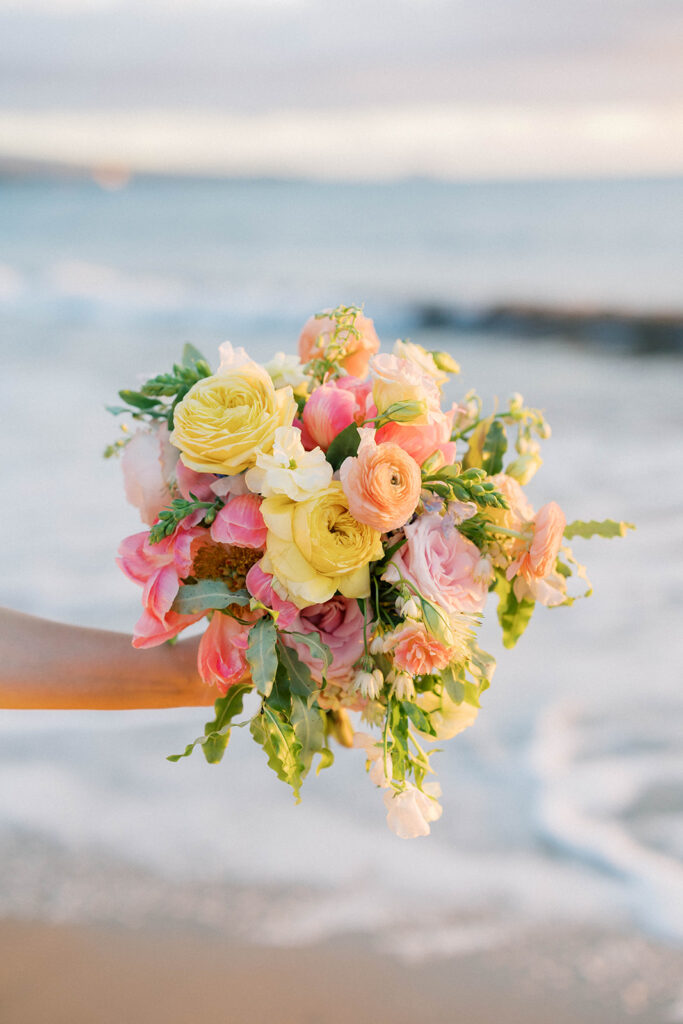 bride's bouquet with the ocean in the background