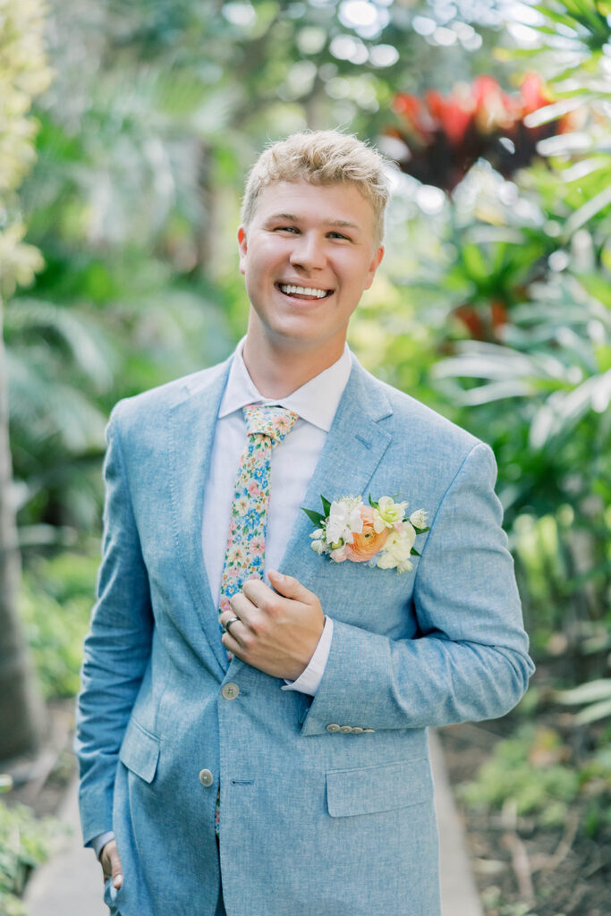 groom portrait laughing