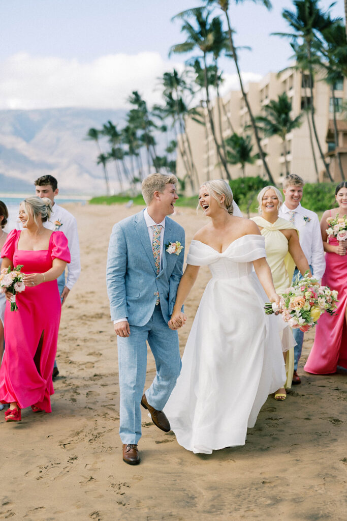 bride and bridesmaids, colorful bridesmaid dresses, wedding party on the beach