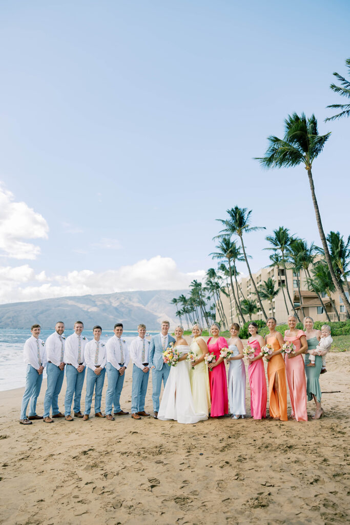 bride and bridesmaids, colorful bridesmaid dresses, wedding party on the beach