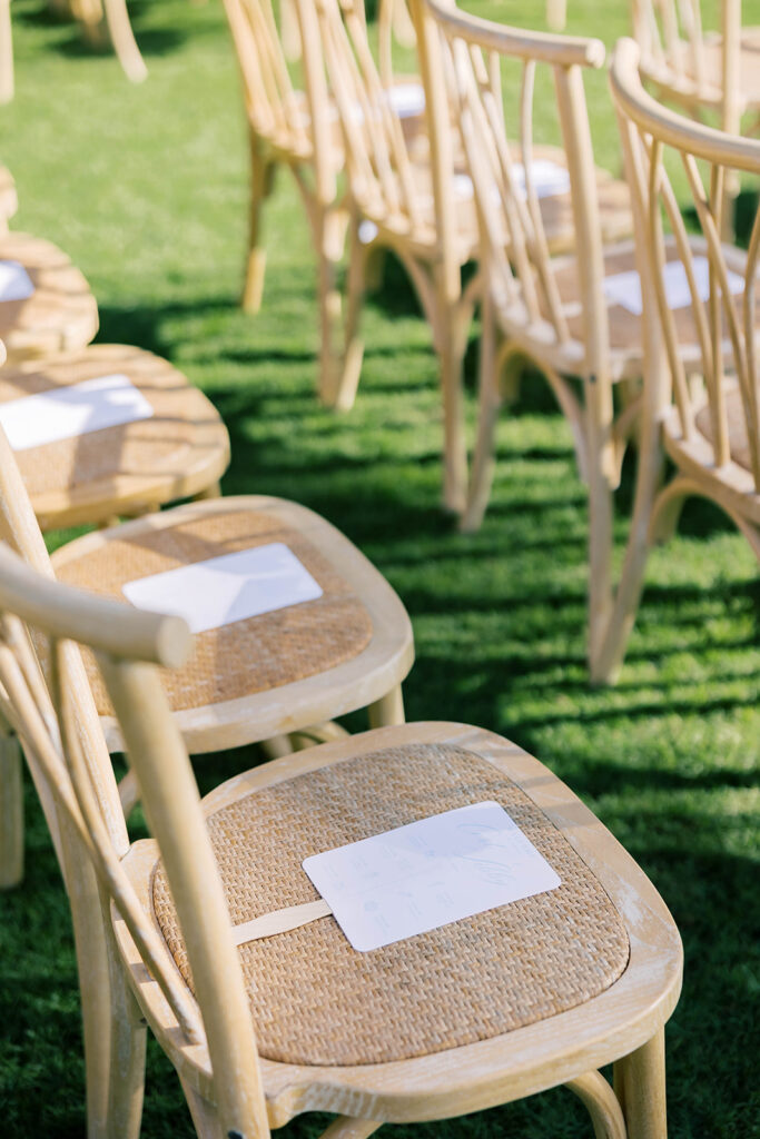 beach wedding, on grass by the beach in maui, bamboo chairs 