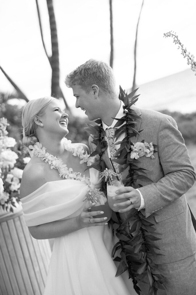 bride and groom beach wedding, leis, on the beach 