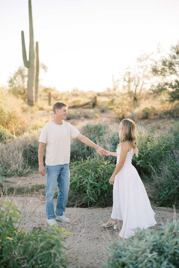 engagement session location idea, couple posing in the desert