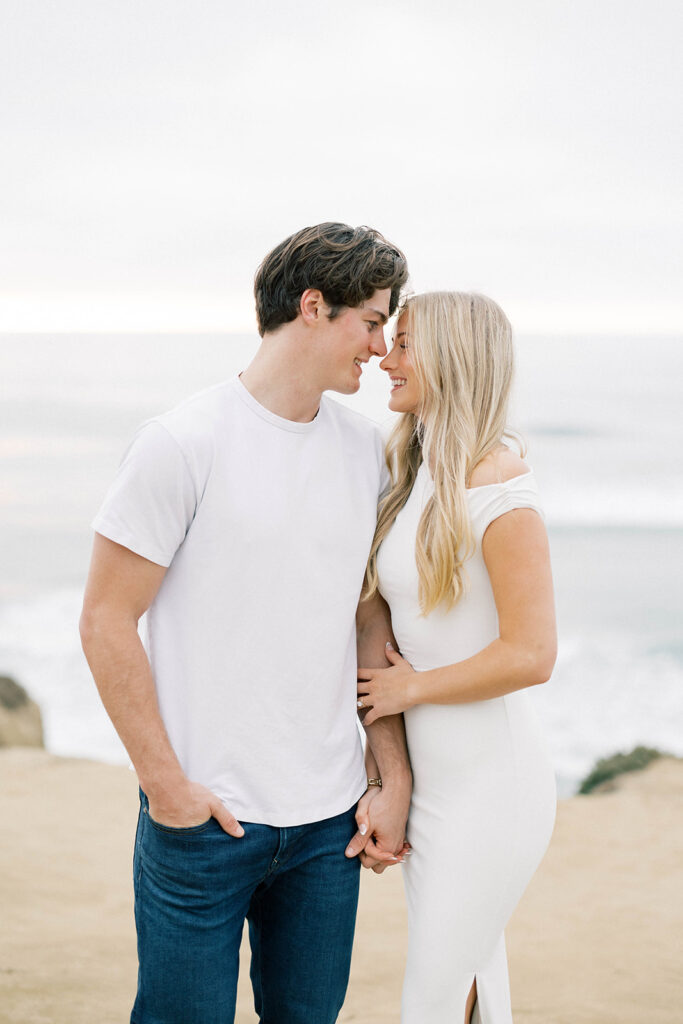 engagement session location idea, couple posing on the beach