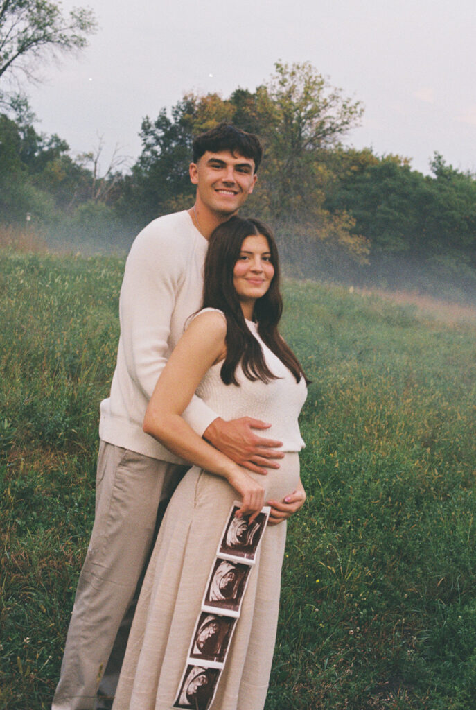 Maternity Session, couple holding up ultrasound photos