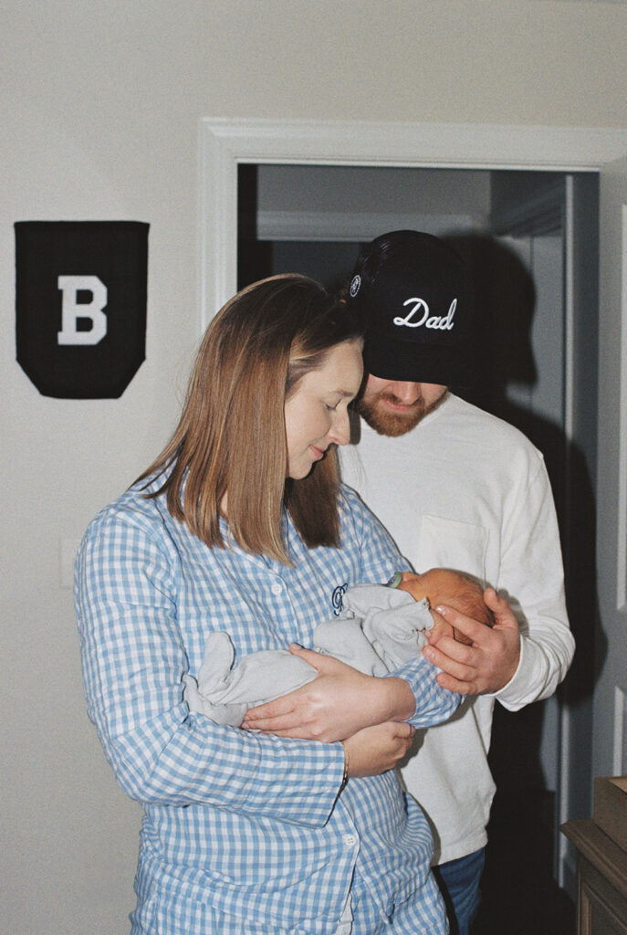 Maternity Session, couple holding their newborn baby