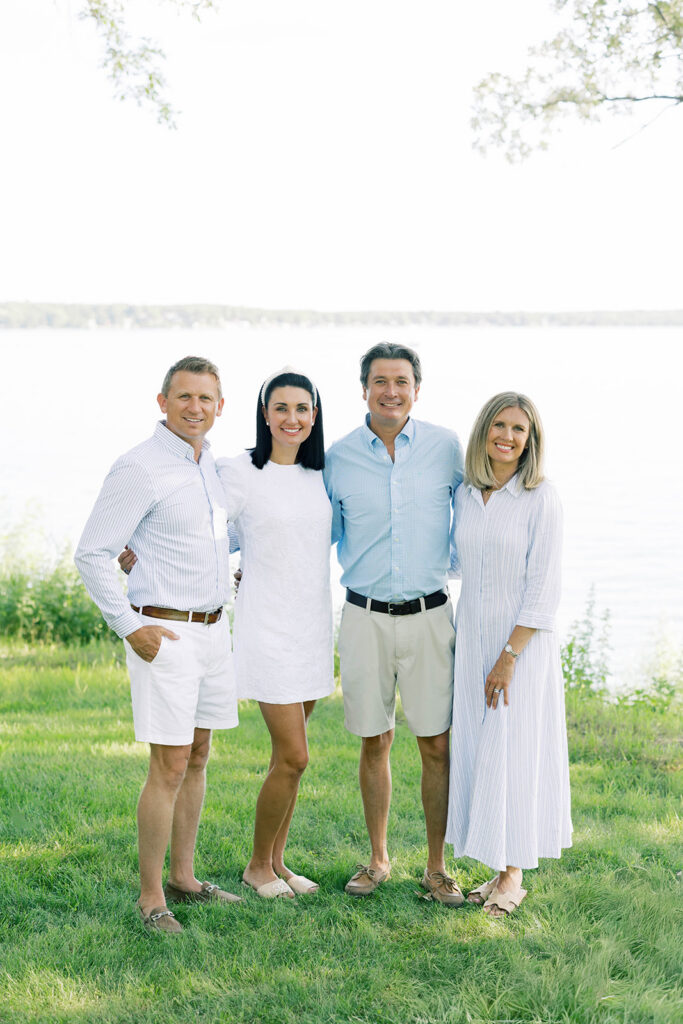Family Portraits, multi-generational family posing in front of a lake