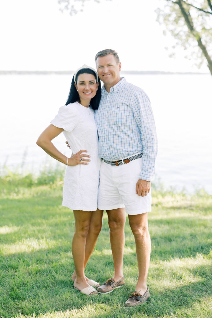 Family Portraits, couple posing in front of a lake