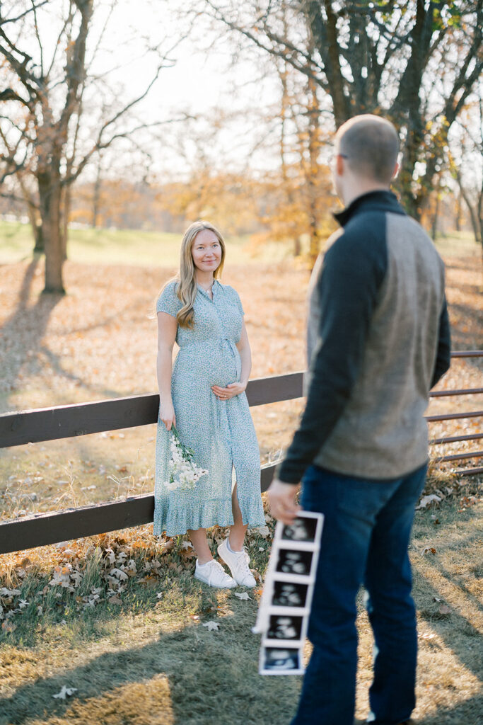 Maternity Session, couple holding up ultrasound photos