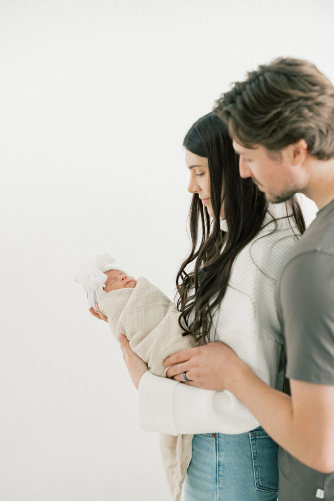 Maternity Session, couple holding newborn baby