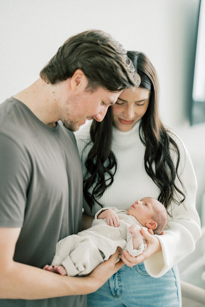 Maternity Session, couple posing with newborn baby 