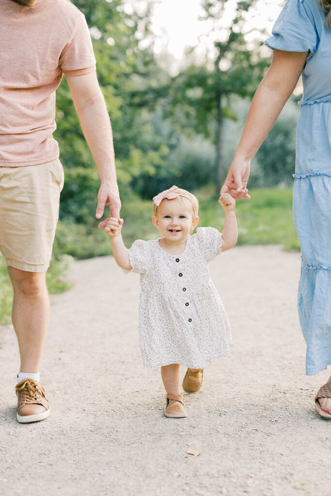 Maternity Session, couple holding hands with their baby