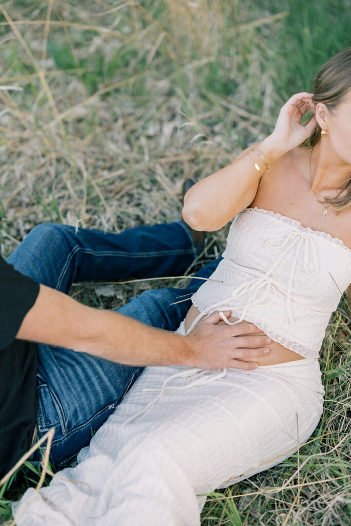 Maternity Session, couple laying in the grass