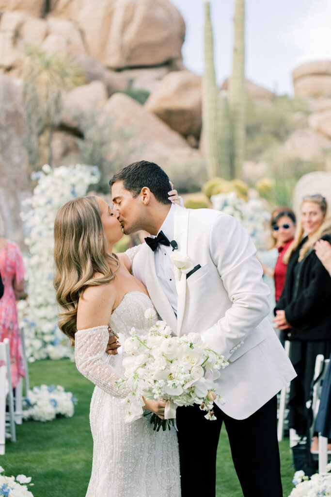 Scottsdale Wedding, bride and groom kiss during ceremony 