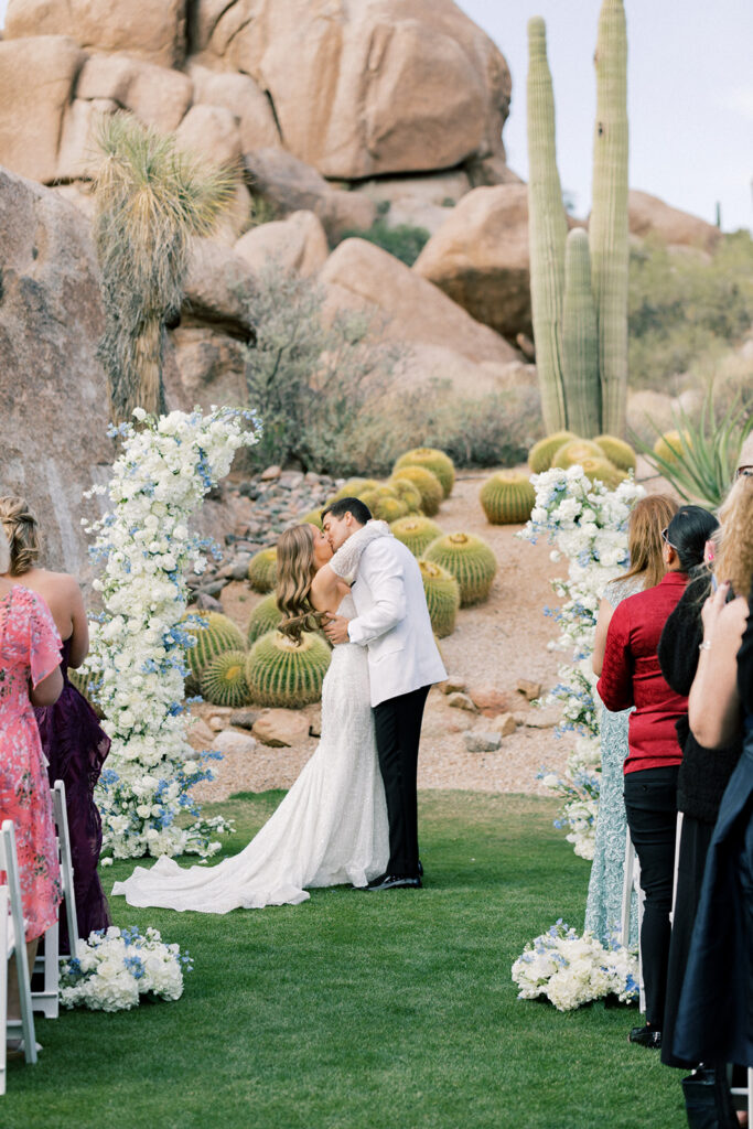 Scottsdale Wedding, bride and groom kiss during ceremony 