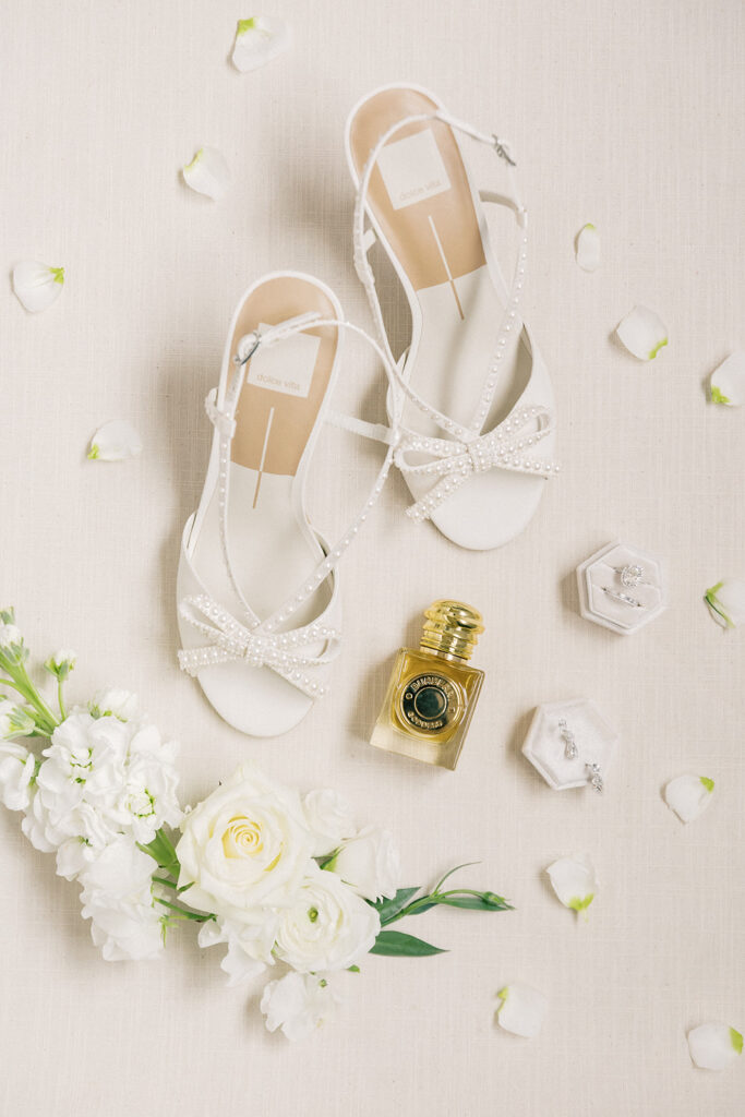 Scottsdale Wedding, detail shot of white heels, flowers, jewelry, and perfume