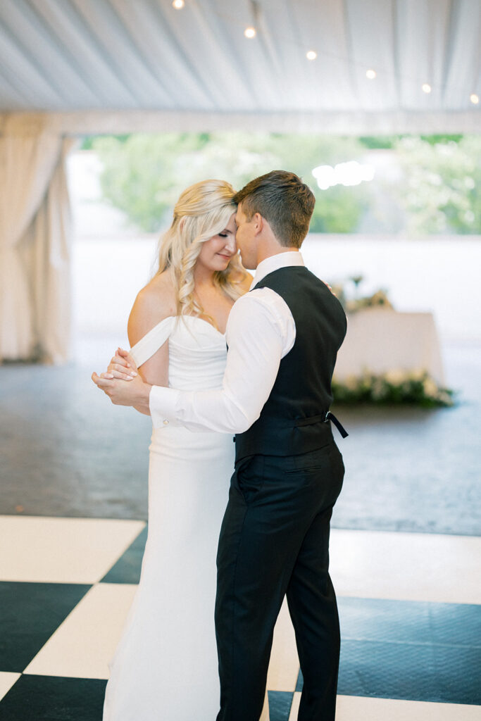 bride and groom dancing