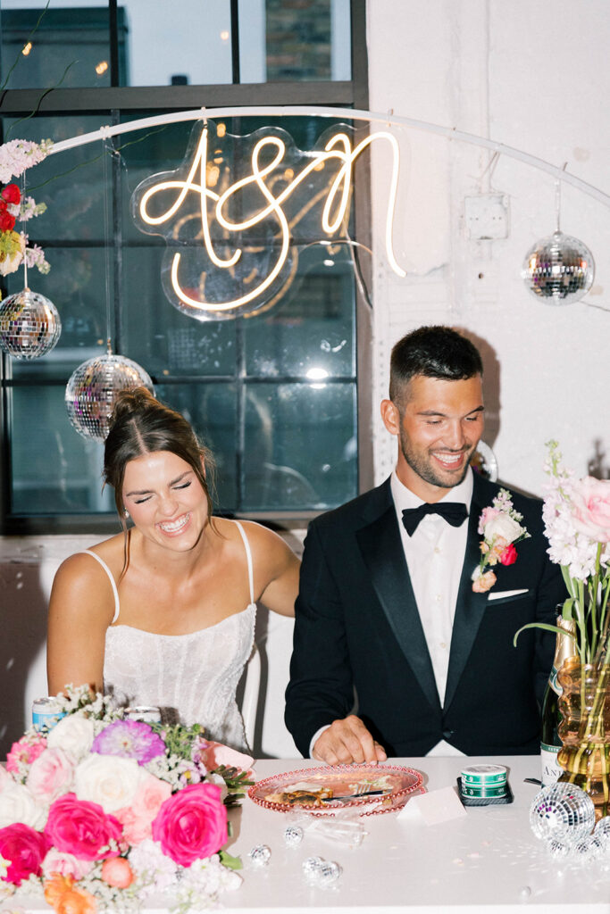 bride and groom at sweetheart table