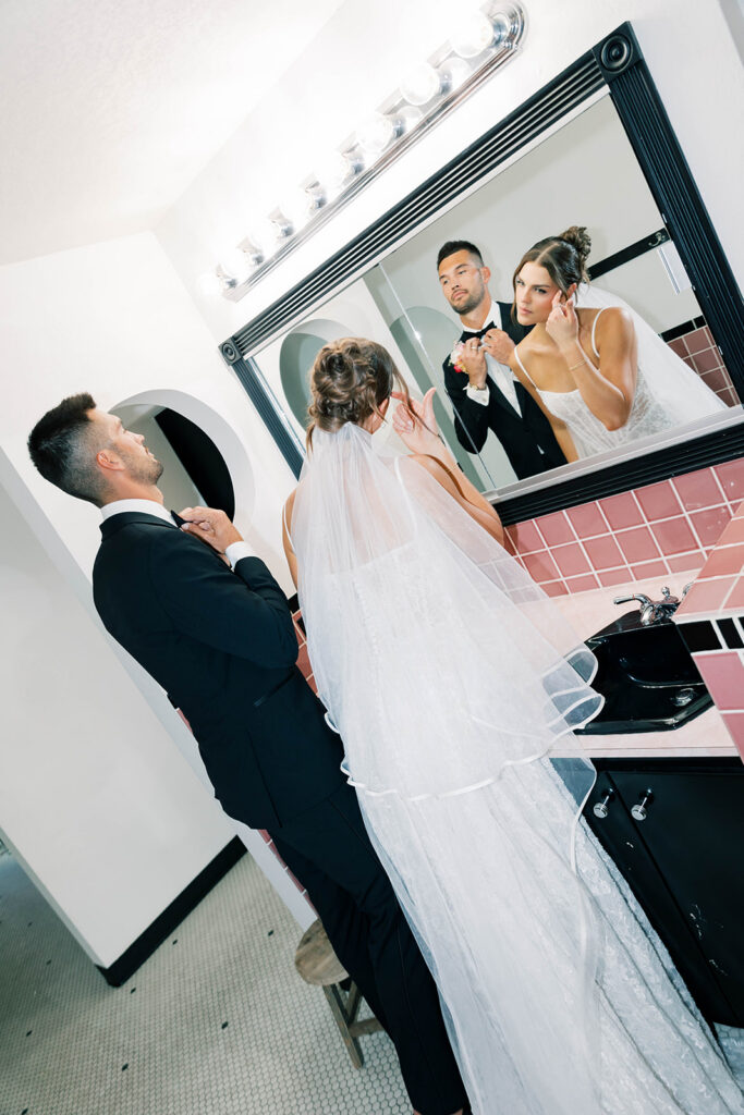bride and groom getting ready