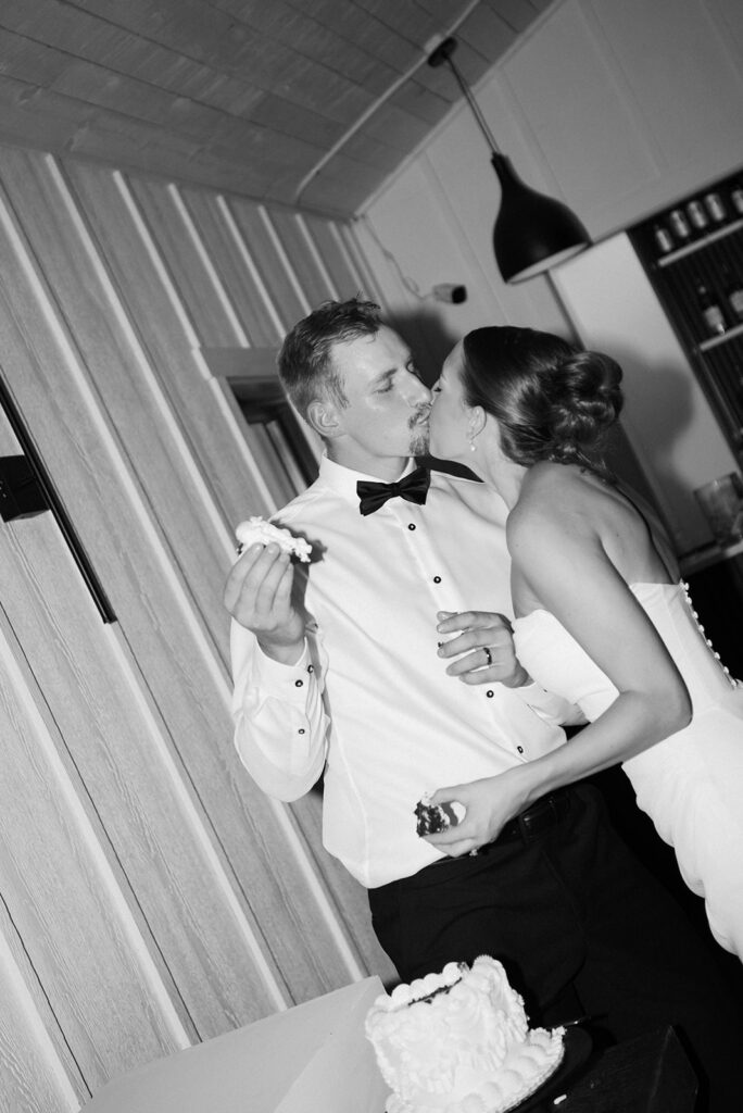 bride and groom eating cake