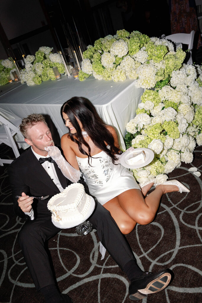 bride and groom eating cake