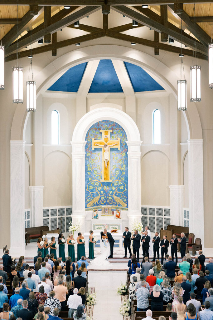 bride and groom ceremony kiss