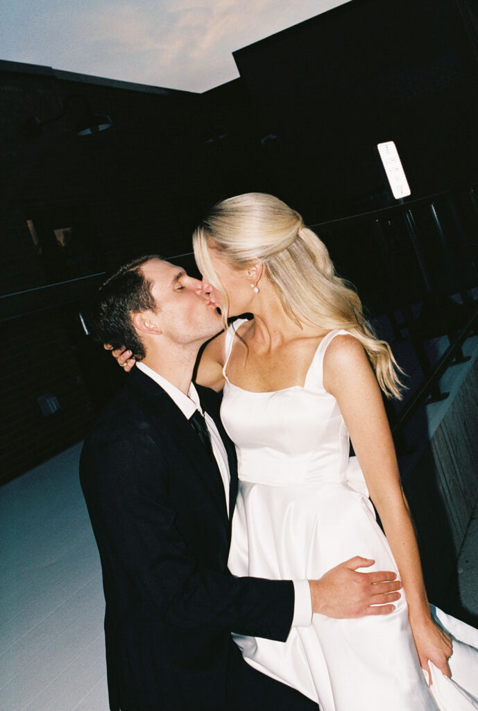 bride and groom kiss