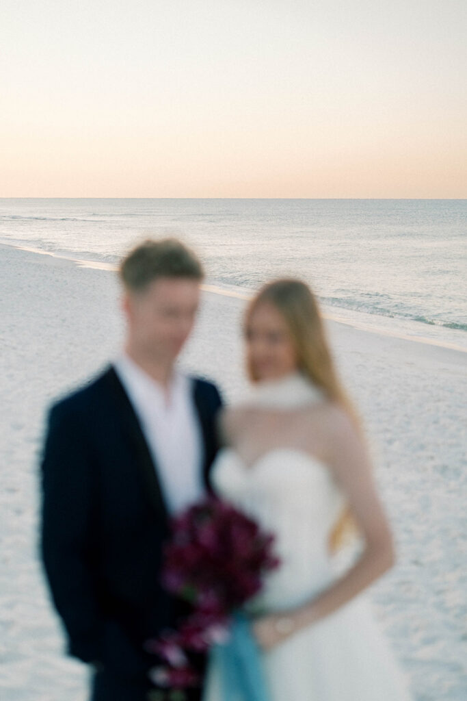 bride and groom portrait on the beach
