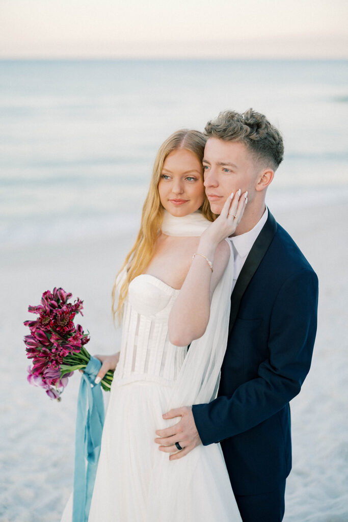 bride and groom portrait on the beach