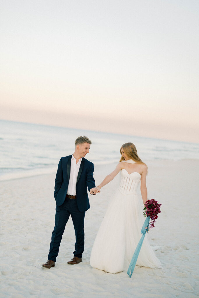 bride and groom portrait on the beach